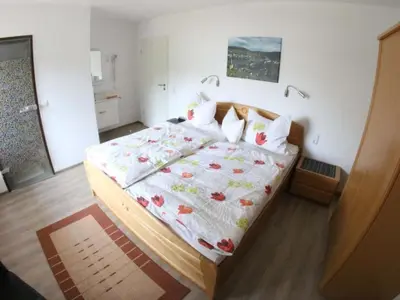 Ein Bett oder Betten in einem Zimmer der Unterkunft Apartment Haus Budinger by Interhome