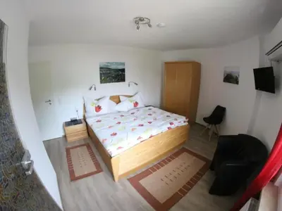 Ein Bett oder Betten in einem Zimmer der Unterkunft Apartment Haus Budinger by Interhome