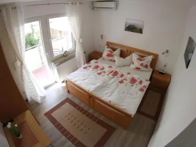 Ein Bett oder Betten in einem Zimmer der Unterkunft Apartment Haus Budinger by Interhome