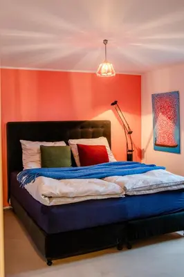 Ein Bett oder Betten in einem Zimmer der Unterkunft HeartArt