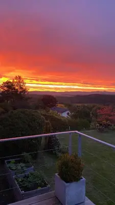 Blick auf den Sonnenuntergang/Sonnenaufgang von der Ferienwohnung aus oder aus der Nähe