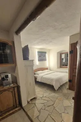 Ein Bett oder Betten in einem Zimmer der Unterkunft Ringhaus Welschenbach
