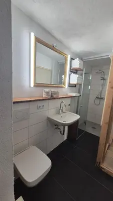 Ein Badezimmer in der Unterkunft Ringhaus Welschenbach