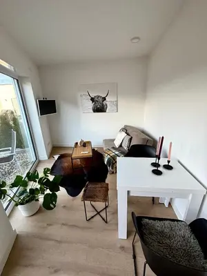 Ein Sitzbereich in der Unterkunft Moderne Ferienwohnung nahe Bostalsee
