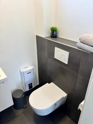 Ein Badezimmer in der Unterkunft Moderne Ferienwohnung nahe Bostalsee