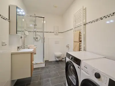 Ein Badezimmer in der Unterkunft Marx - Modernes Apartment - Top Lage im Zentrum - Gratis WLAN - ideal für Geschäftsreisende & Paare