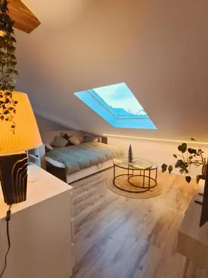Ein Sitzbereich in der Unterkunft Stilvolles Apartment im Loft-Style & Klimaanlage