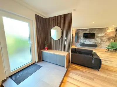 Ein Sitzbereich in der Unterkunft Ferienwohnung Kirchberg - Andernach am Rhein