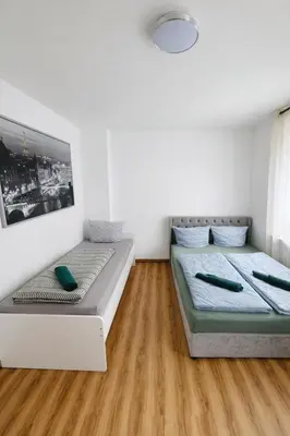 Ein Bett oder Betten in einem Zimmer der Unterkunft 2-Zimmer-Wohnung an der Mosel mit Terrasse