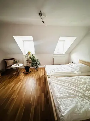 Ein Bett oder Betten in einem Zimmer der Unterkunft Weingut Christian Bechtel