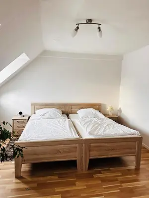 Ein Bett oder Betten in einem Zimmer der Unterkunft Weingut Christian Bechtel