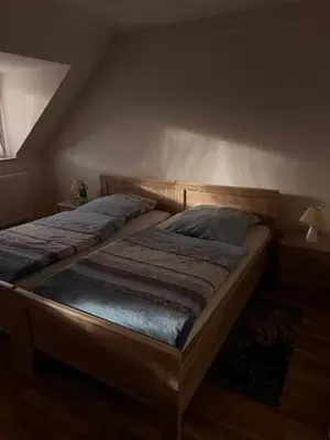 Ein Bett oder Betten in einem Zimmer der Unterkunft Weingut Christian Bechtel