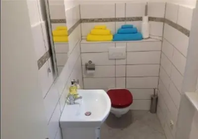 Ein Badezimmer in der Unterkunft Pension Yachthafen, Nikolausufer 40