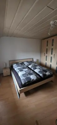 Ein Bett oder Betten in einem Zimmer der Unterkunft Ferienwohnung Chandony
