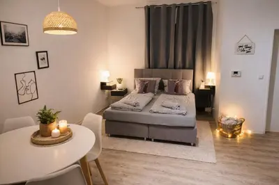 Ein Bett oder Betten in einem Zimmer der Unterkunft Komfort Apartment nahe Hauptbahnhof Koblenz