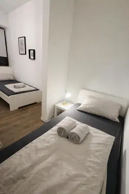 Ein Bett oder Betten in einem Zimmer der Unterkunft Komfort Apartment nahe Hauptbahnhof Koblenz