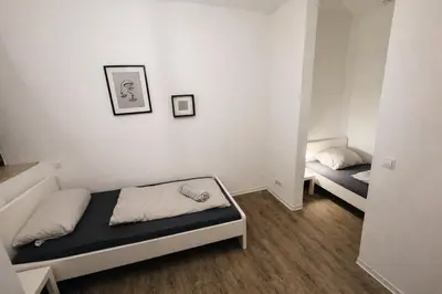 Ein Bett oder Betten in einem Zimmer der Unterkunft Komfort Apartment nahe Hauptbahnhof Koblenz