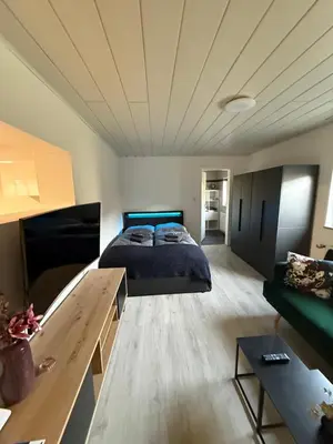 Ein Bett oder Betten in einem Zimmer der Unterkunft Ferienwohnung Jana