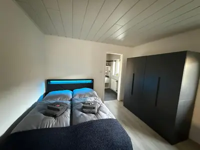 Ein Bett oder Betten in einem Zimmer der Unterkunft Ferienwohnung Jana