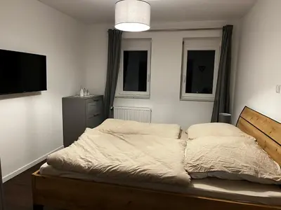 Ein Bett oder Betten in einem Zimmer der Unterkunft Ferienwohnung Brönnleins