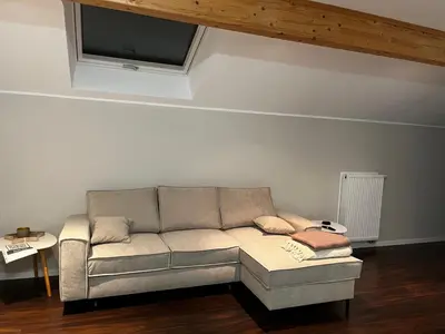 Ein Sitzbereich in der Unterkunft Ferienwohnung Brönnleins