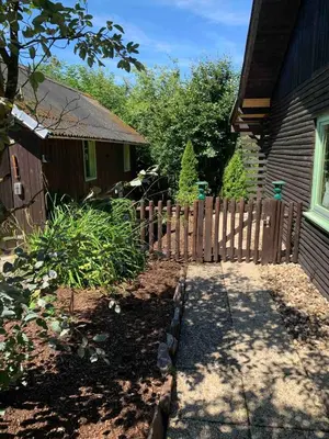 Ein Garten an der Unterkunft Gemütliches Ferienhaus