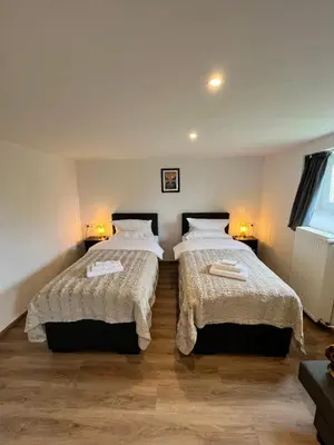 Ein Bett oder Betten in einem Zimmer der Unterkunft Aparts4ring 10, Nürburg