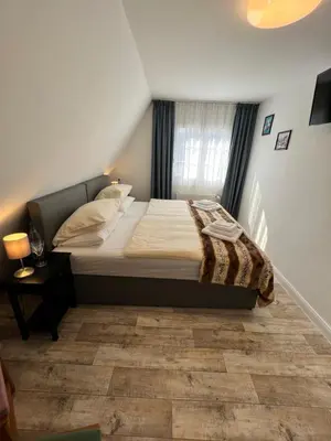 Ein Bett oder Betten in einem Zimmer der Unterkunft Aparts4ring 10, Nürburg