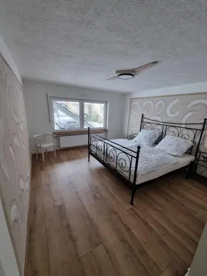 Ein Bett oder Betten in einem Zimmer der Unterkunft Ferienwohnung Braun