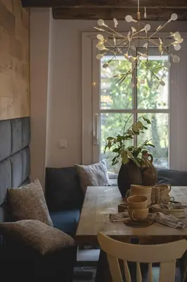 Ein Sitzbereich in der Unterkunft Hofgut Eveshausen Familienquartier Chalet 6-11 Gäste