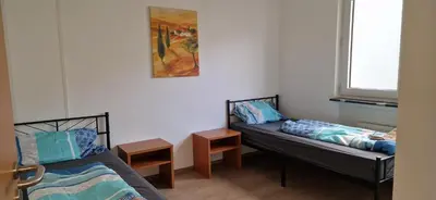 Ein Bett oder Betten in einem Zimmer der Unterkunft Schöne Monteurwohnung Fewo im Zentrum von Bingen