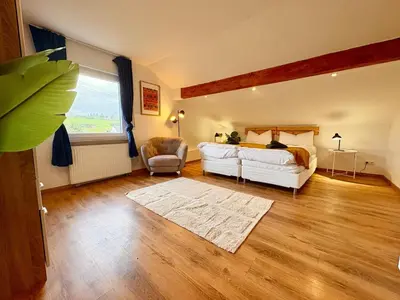 Ein Bett oder Betten in einem Zimmer der Unterkunft Townhaus Mariaroth