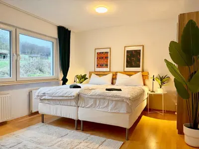 Ein Bett oder Betten in einem Zimmer der Unterkunft Townhaus Mariaroth