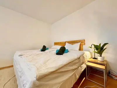 Ein Bett oder Betten in einem Zimmer der Unterkunft Townhaus Mariaroth
