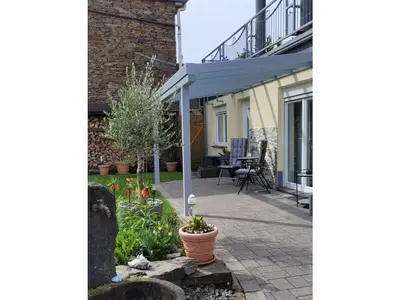 Ein Garten an der Unterkunft Holiday apartment in Moselkern with barbecue