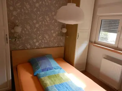 Ein Bett oder Betten in einem Zimmer der Unterkunft Eifelcottage Stork's Nest