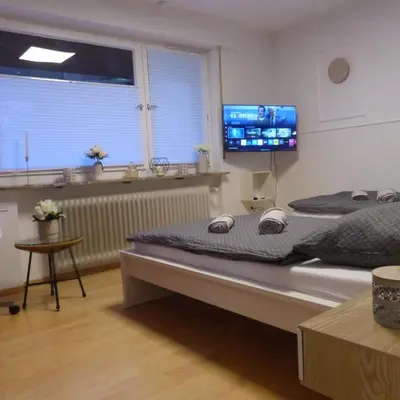 Ein Bett oder Betten in einem Zimmer der Unterkunft ChrisTho - Am Rheinsteig
