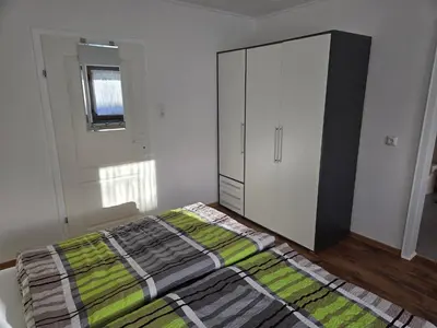 Ein Bett oder Betten in einem Zimmer der Unterkunft Ferienhaus Flieja