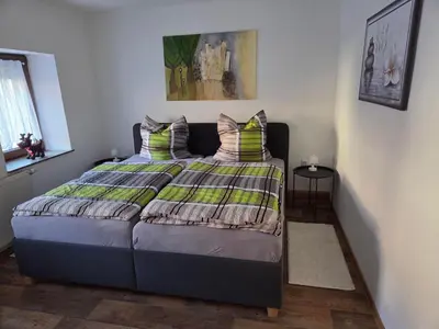 Ein Bett oder Betten in einem Zimmer der Unterkunft Ferienhaus Flieja