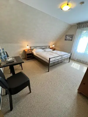 Ein Bett oder Betten in einem Zimmer der Unterkunft Aparts4ring 5 Nürburg