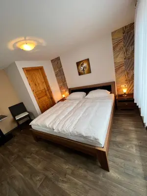 Ein Bett oder Betten in einem Zimmer der Unterkunft Aparts4ring 5 Nürburg