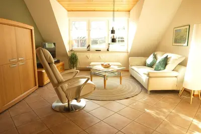 Ein Sitzbereich in der Unterkunft Ferienwohnung Frings
