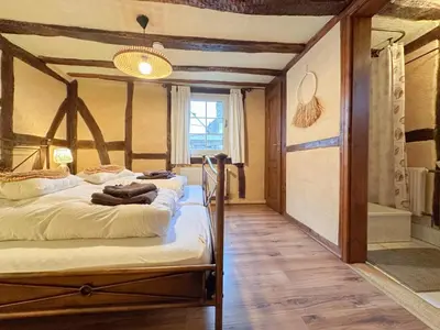 Ein Bett oder Betten in einem Zimmer der Unterkunft Neef