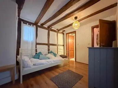 Ein Bett oder Betten in einem Zimmer der Unterkunft Neef