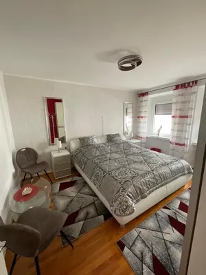 Ein Bett oder Betten in einem Zimmer der Unterkunft Ferienwohnung bei Toni und Klaus
