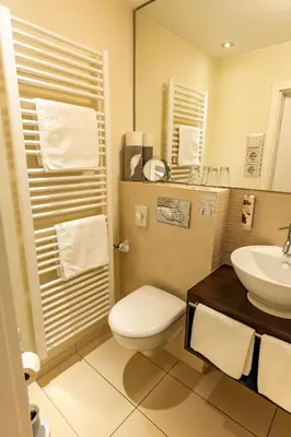 Ein Badezimmer in der Unterkunft Pension und Restaurant Zur kleinen Rebe