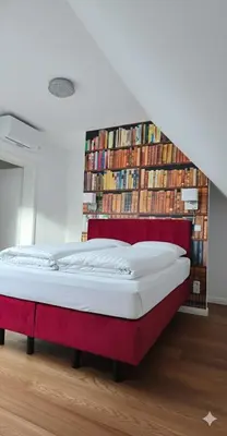 Ein Bett oder Betten in einem Zimmer der Unterkunft Karmeliterhof Studios & Suites