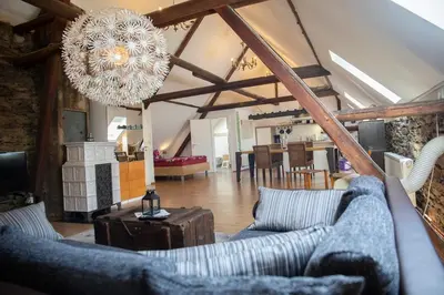 Ein Sitzbereich in der Unterkunft Ferienhaus zum Brauneberg