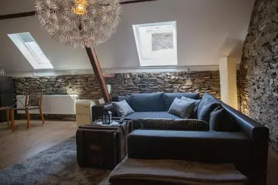 Ein Sitzbereich in der Unterkunft Ferienhaus zum Brauneberg