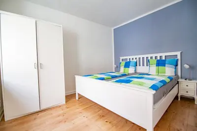 Ein Bett oder Betten in einem Zimmer der Unterkunft Ferienhaus zum Brauneberg